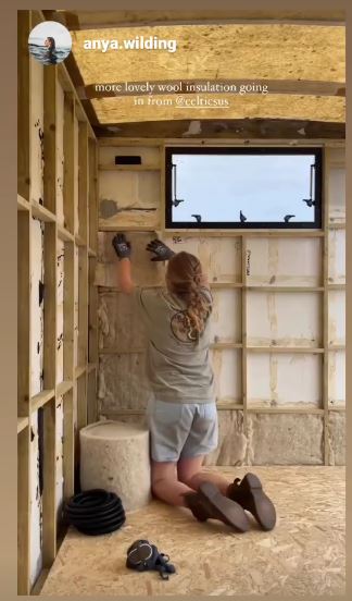 Anya Wilding insulating a camper